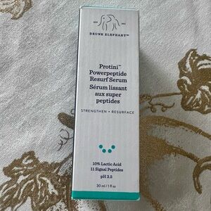 Drunk Elephant Protini Powerpeptide Resurf Serum in White and Teal